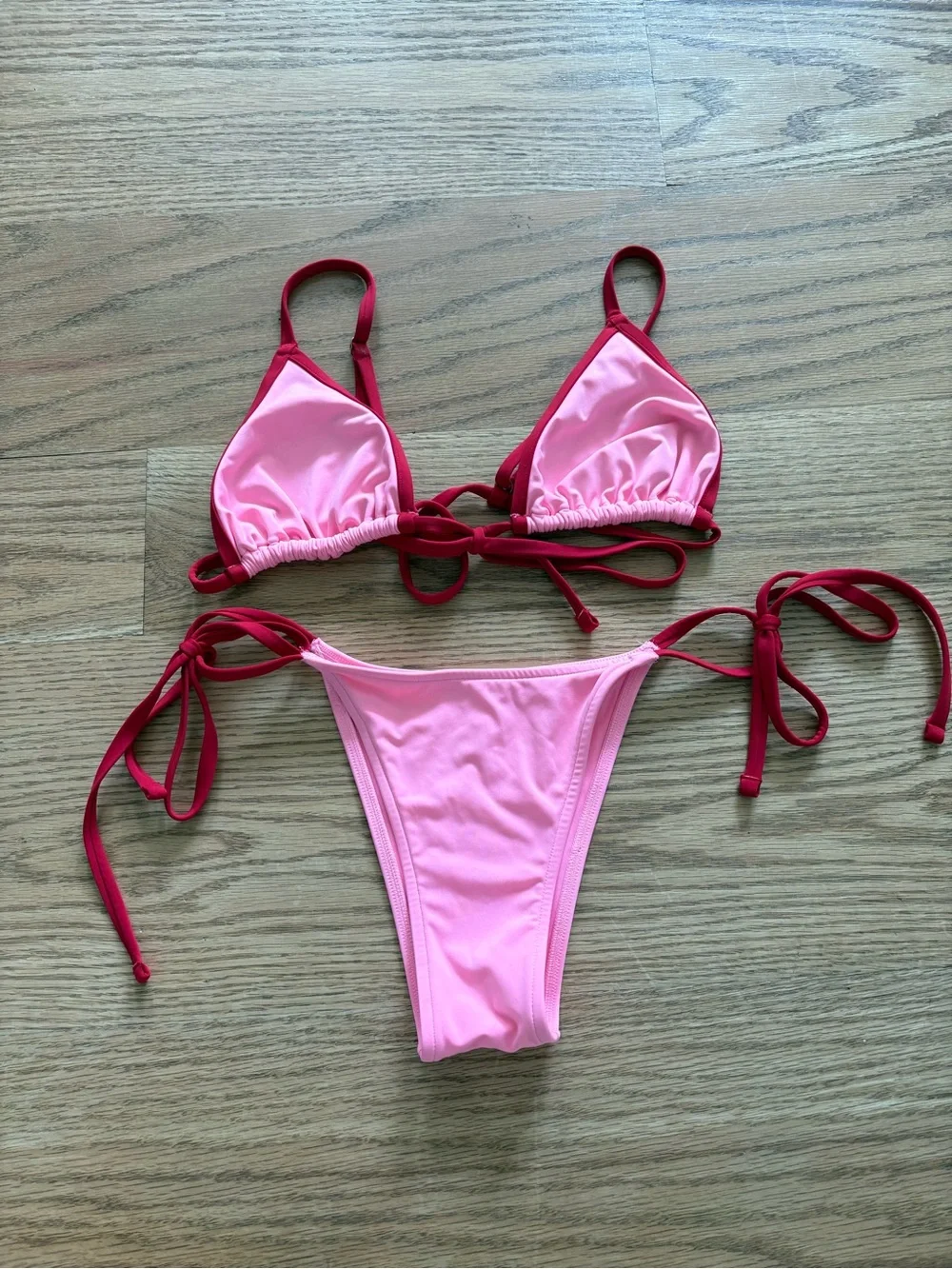 Frankie’s Bikinis Pink Triangle Bikini Set with Red Trim
